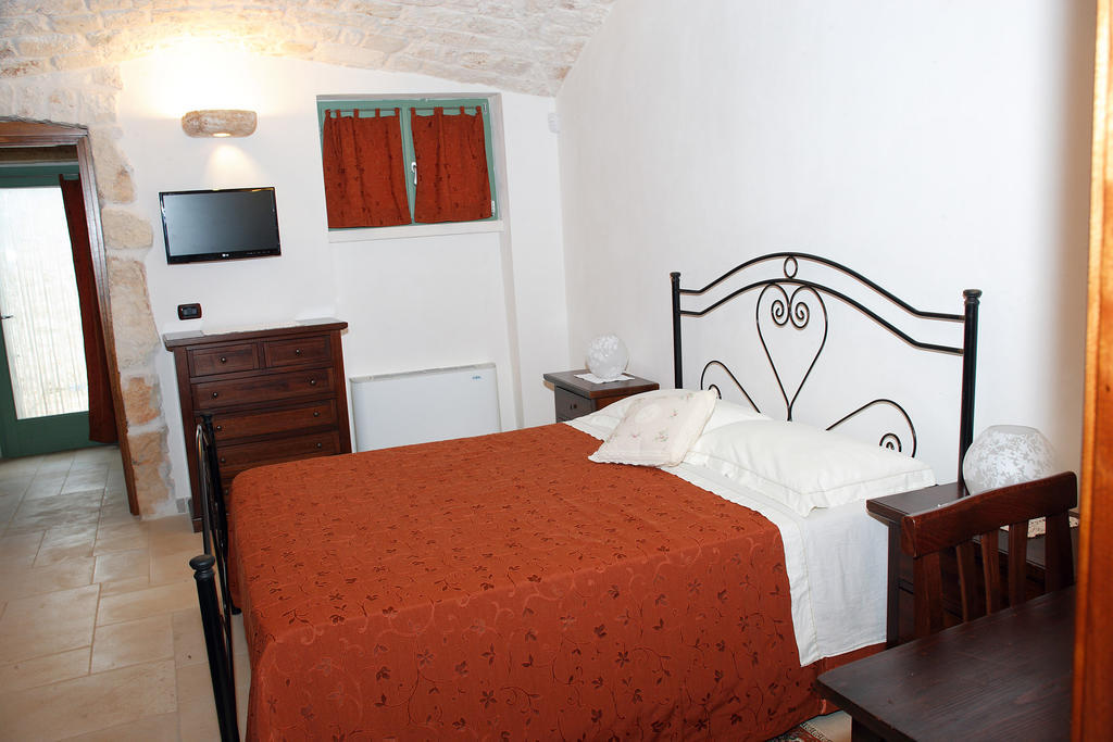 Trulli Boccadoro Hotell Ostuni Rum bild